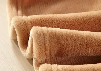 Custom Soft Fabric Textile Raw Material 100 Polyester Solid Flannel Fleece Fabric for Blanket and Garment 